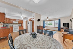 Indoors, Floor, Flooring, Furniture, Table