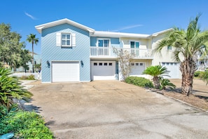 Front of the house with parking.