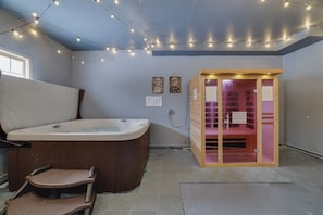 Unwind in the hot tub or enjoy the indoor sauna—your private retreat for relaxation and rejuvenation.