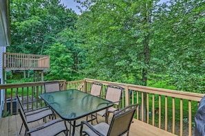 Step out the sliding doors in the dining area to grill that perfect family feast while listening to the sounds of the Poconos!
