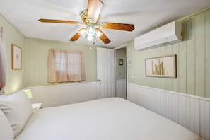 Bedroom #1 the main bedroom has a queen bed and open closet