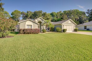 Property Exterior | Screened-In Lanai | Private Pool | Spacious Yard