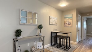 Open concept Living and Dining Area. Dining table seats 4 guests.