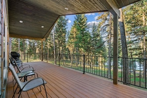 Deck with view of lake