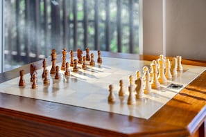 Unplug and reconnect — classic games with a view of the pines.