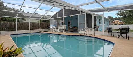 Large private screened-in swimming pool