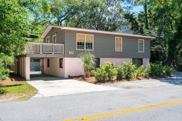This home has ample parking and a spacious upstairs deck.