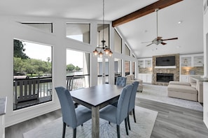 Wall of windows offering panoramic lake views