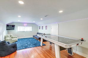 Den | 2nd Floor | Full Futon | Air Hockey Table | Smart TV