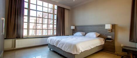 Unit with two Twin beds, or one Double bed. Actual room type may vary