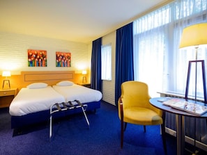 Unit with 2 single beds. Exact unit will be assigned upon arrival. Views, colors, and decor may vary.