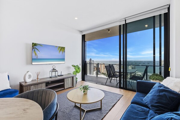 Experience luxury living while lounging around this elegant living room