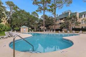 A great view of the outdoor pool, one of two outdoor pools and one indoor pool for year round enjoyment.  