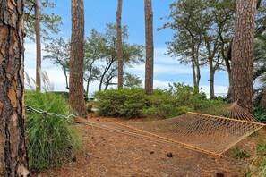 Get relaxed in hammock with the beach view which is just outside your waterfront villa.