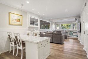 The space is designed to cater to various needs, whether it be a cozy family gathering, entertainment, or a serene space for relaxation.