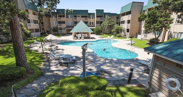 The pool just outside your Villa. The resort complex features two outdoor pools, indoor pool, tennis courts, work out room, indoor dry sauna, shuffle board, bbq grills, wonderful sunrise views.