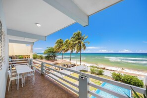 Fully equipped kitchen for home-cooked meals. Enjoy breakfast or dinner with natural light and a cozy island feel.