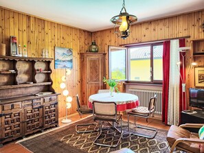 Furniture, Interior Design, Flooring, Wood, Ceiling, Floor, Light Fixture, Lighting, Room, Living Room