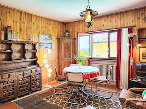 Furniture, Interior Design, Flooring, Wood, Ceiling, Floor, Light Fixture, Lighting, Room, Living Room