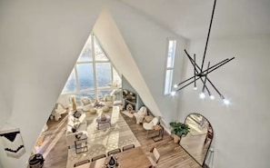 Lake views that inspire. Unwind in the airy and bright living room of The Waterfront Chalet