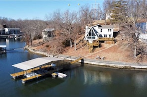 Experience the magic of lake living! This front lake home is your gateway to relaxation and adventure.