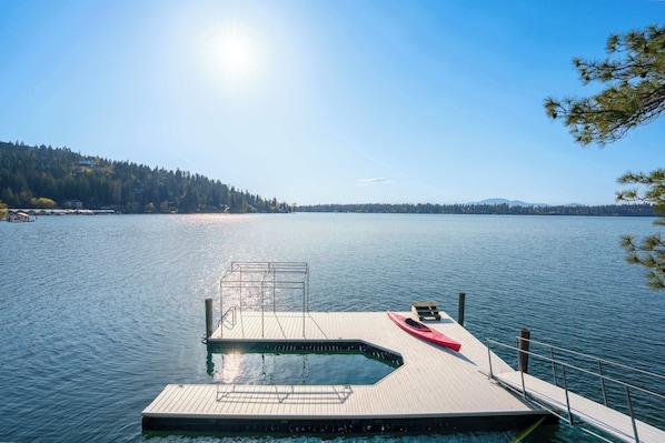 Start your day with a paddle or soak in the views from your private dock on Hayden Lake