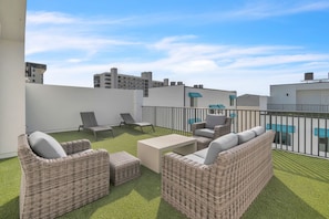 Private Rooftop Deck with Seating and Lounge Chairs