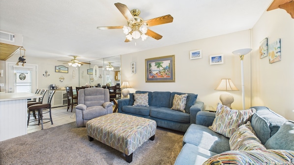 Open concept living area with comfortable furnishings