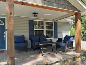 Relax on the front patio with morning coffee or evening wine