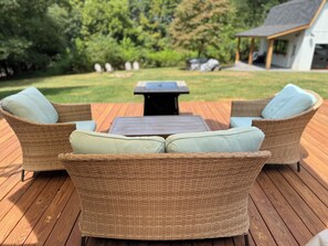 Deck is over 1500 sq ft with seating for 8