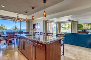 HKH-201 Host in style with a chef-worthy kitchen, granite finishes, and a dining room framed by sweeping ocean views.