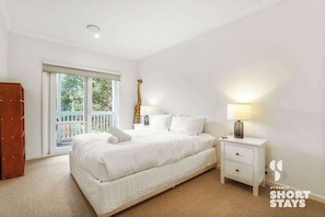 Second bedroom with balcony