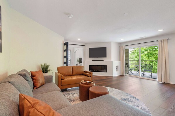 Curl up in the breezy living room & stream your favorites on the smart TV