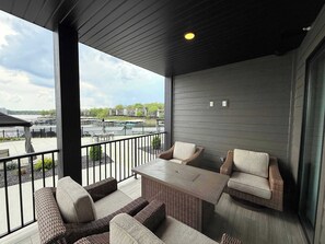 Wrap around deck with outdoor seating, grill, and fire pit 