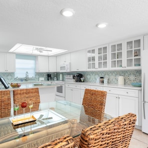 Gather for meals together at the dining table, with seating for 6