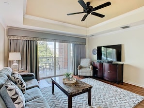 Relax in the living space and enjoy a cozy movie night with family or friends.