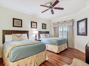 Two full beds offer a comfortable sleeping arrangement for friends, siblings, or travel companions.