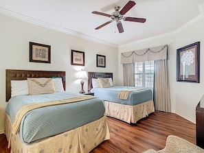 Two full beds offer a comfortable sleeping arrangement for friends, siblings, or travel companions.
