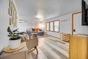 Living Area | Queen Sleeper Sofa | Flat-Screen TV