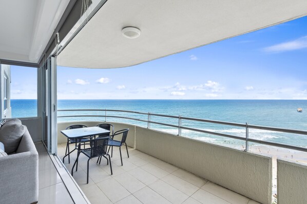 Enjoy your morning coffee in this spacious balcony overlooking the ocean 