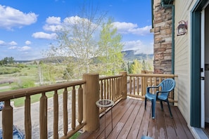 Enjoy the views from the deck while sipping coffee or wine.