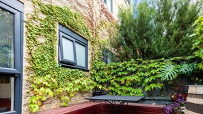 Outdoor leafy patio, perfect for unwinding.