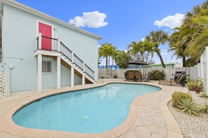 Full view of the pool and patio.