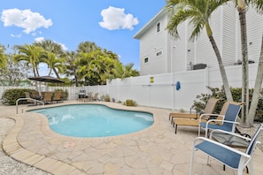 Patio offers chaise lounges and various seating.