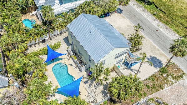 Aerial View of the home with front and back shown.