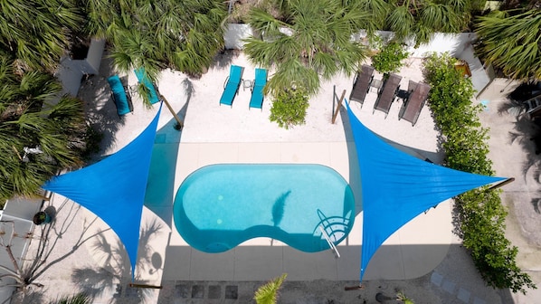 Aerial View of pool and patio with shade sails.