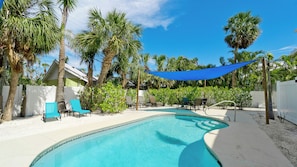 Pool and patio from the West side.
