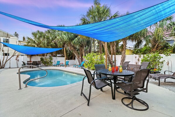 Full view of the pool and patio area.
