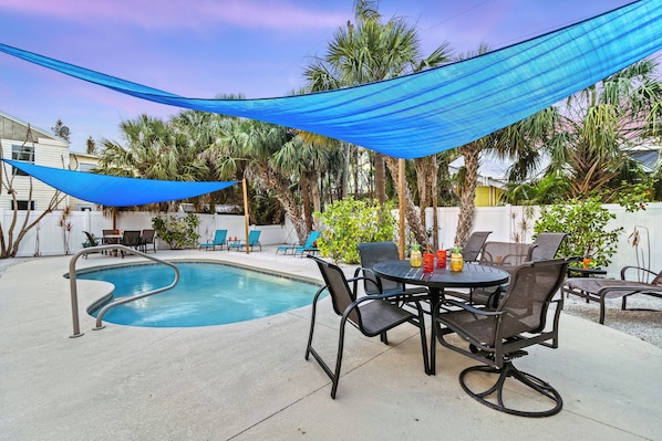 Full view of the pool and patio area.