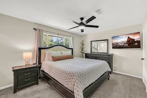 Primary bedroom with a king bed